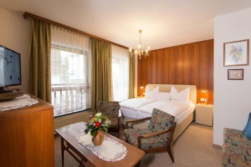 Ένα ή περισσότερα κρεβάτια σε δωμάτιο στο Ferienappartements Brandner