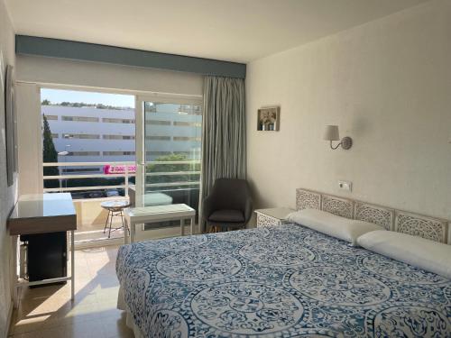 Postel nebo postele na pokoji v ubytování Hostal Roberto