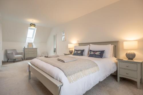 Voodi või voodid majutusasutuse The Middle House by Big Skies Cottages toas