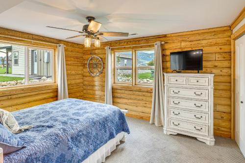 a bedroom with a bed and a tv on a dresser at Mountain-View Red Lodge Home - 10 Mi to Skiing! in Red Lodge
