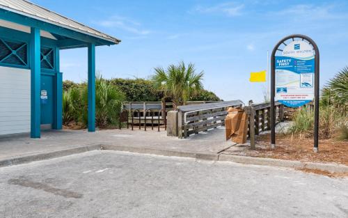 a gas station with a sign in front of it at Another Day on 30A by Oversee 30A in Santa Rosa Beach