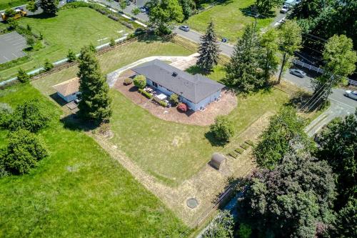 an overhead view of a house in a field with trees at Vogel Vacation - Spacious Secluded, Hot Tub & Game Room in Damascus