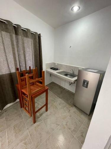 Kuchyň nebo kuchyňský kout v ubytování Departamento AF 17