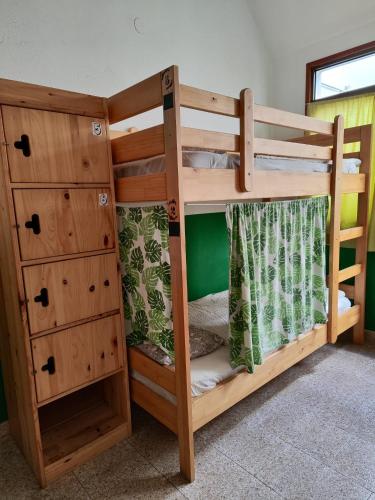 Ένα ή περισσότερα κρεβάτια σε δωμάτιο στο Hostel Vagamundo