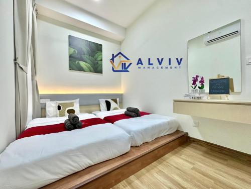 NEW! The Apple Residence I 2-3BR I Game I 5min Jonker - Managed by Alviv Homestayにあるベッド