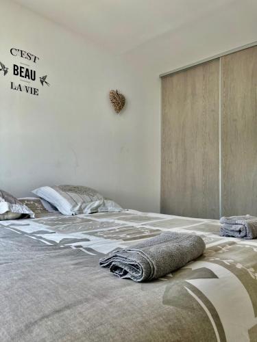 Un ou plusieurs lits dans un hébergement de l'établissement Maison Lilouma Disneyland Paris