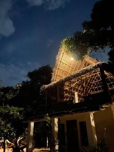 a building with the light on top of it at Art Forest in Puducherry