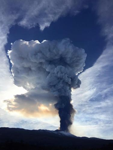 a billowing cloud of smoke in the sky at Holiday Home Gionny & Mary in Taormina