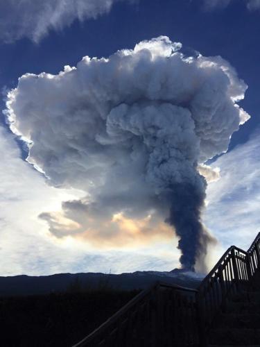 a large cloud of smoke in the sky at Holiday Home Gionny & Mary in Taormina