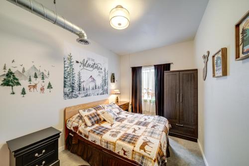 a bedroom with a bed and a window at Unique Country Farmhouse Near Lake Roosevelt in Fort Spokane