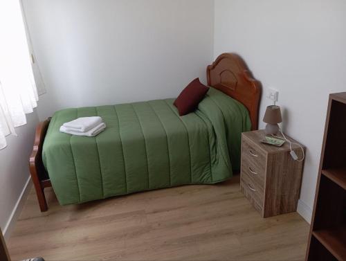 Ένα ή περισσότερα κρεβάτια σε δωμάτιο στο Apartamento en Cedeira