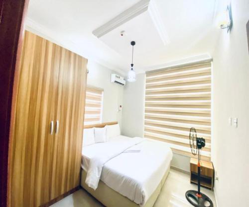 Postel nebo postele na pokoji v ubytování AB Apartments