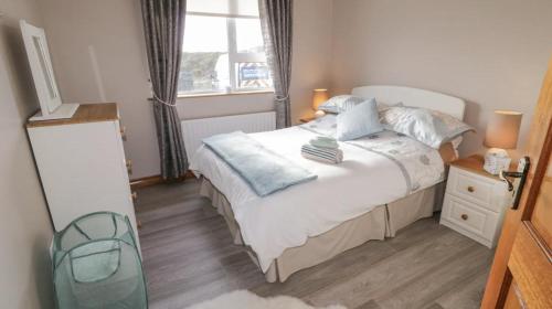 Postel nebo postele na pokoji v ubytování Breezy Point Accommodation