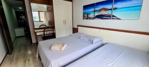 Katil atau katil-katil dalam bilik di Flat Pasárgada 812, pé na praia