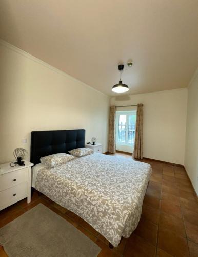 Ένα ή περισσότερα κρεβάτια σε δωμάτιο στο Old Zone Apartments 1A