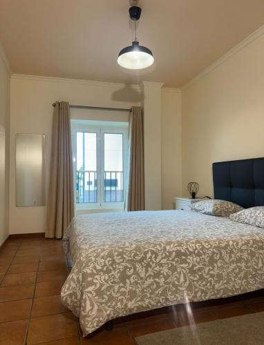 Ένα ή περισσότερα κρεβάτια σε δωμάτιο στο Old Zone Apartments 1A