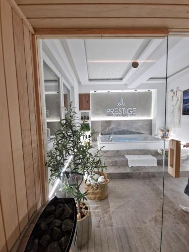 a room with a bathroom with a bath tub at Spa Prestige Apartman Brcko in Brčko
