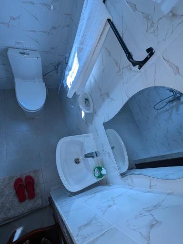 Ванная комната в JACARANDA HOMESTAY