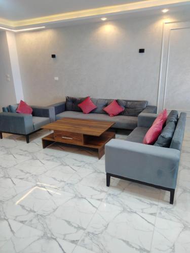 Гостиная зона в Porto Said Apartment powered By Amer-Group family only