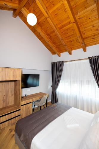 Cama o camas de una habitación en Hotel Vila 101-New Bazaar