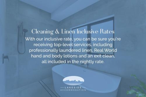 a screenshot of a bathroom with a sign that says cleaning and linear inclusive rates at Great Lake Getaway - Taupo in Taupo