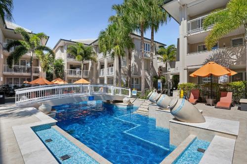 an image of a swimming pool at a apartment complex at Hastings Suites by Stay Noosa in Noosa Heads