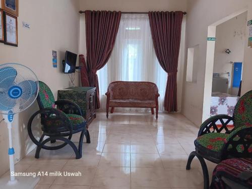 Φωτογραφία από το άλμπουμ του Vila Anggur Pintukabun σε Bukittinggi