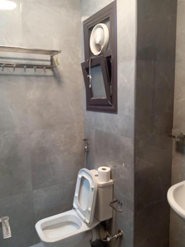 Ванная комната в Porto Said Apartment powered By Amer-Group family only