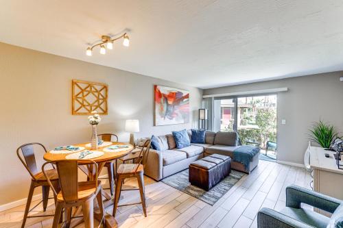 a living room with a table and a couch at Unwind Poolside, Walk to Old Town! Scottsdale Unit in Scottsdale