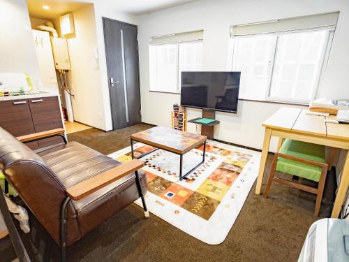 CHALET BURLAP FURANUIにあるテレビまたはエンターテインメントセンター