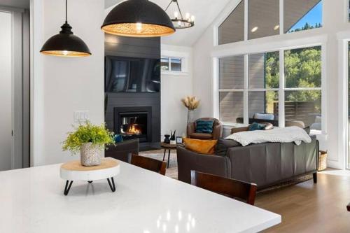 a living room with a couch and a fireplace at Harmony Retreat in Ronald