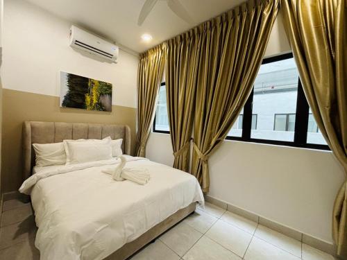 a bedroom with a bed and a large window at Youth City Residence Nilai in Nilai