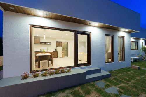 a house with a dining room and a kitchen at Soye stay in Gyeongju