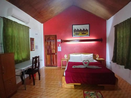 Postel nebo postele na pokoji v ubytování Sambag Hideaway Bungalows