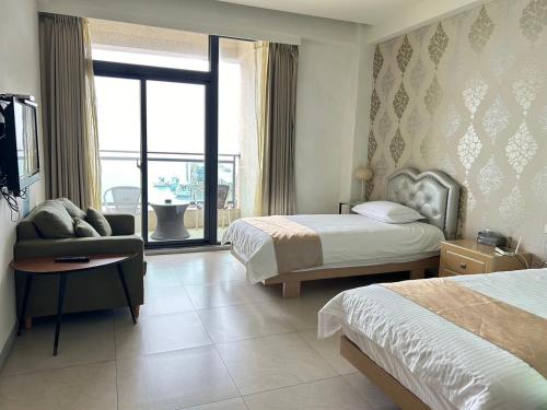 Ein Bett oder Betten in einem Zimmer der Unterkunft Matsu Star Yang Homestay