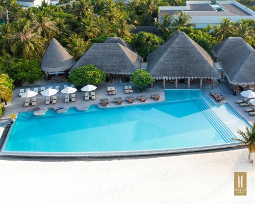 an aerial view of the resort with a swimming pool at Heritance Aarah - Premium All Inclusive - 40 Minutes away from Male by Seaplane in Raa Atoll