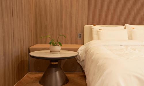 Postel nebo postele na pokoji v ubytování Brown Dot Hotel Gunsan Terminal Branch