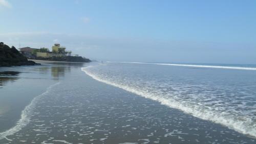 a view of a beach with waves in the water at Casa Aventura in San Clemente