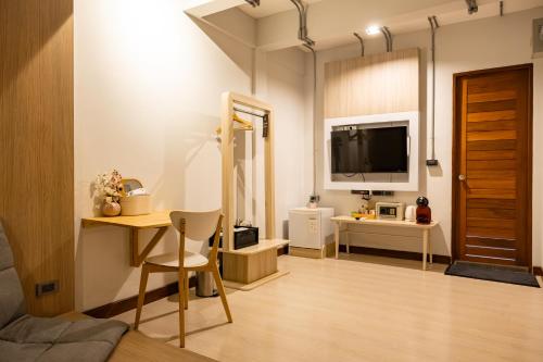 TV a/nebo společenská místnost v ubytování The Brown Hotel
