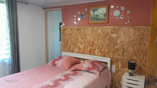 Postel nebo postele na pokoji v ubytování FRUITS DE LA PASSION