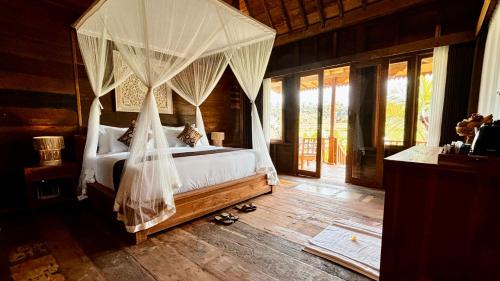 Katil atau katil-katil dalam bilik di Jagadhita Villas Ubud Bali