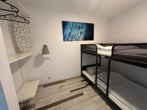 Ένα ή περισσότερα κρεβάτια σε δωμάτιο στο Heights Accommodation City Center
