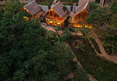an aerial view of a house with lights on at Samora River Lodge in Arusha