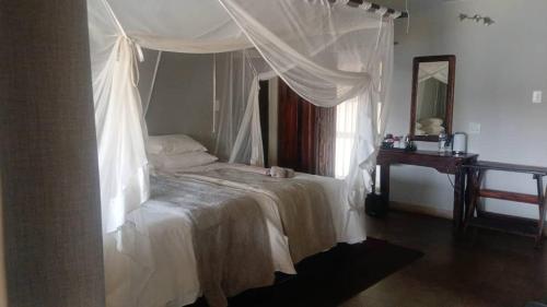 Cama o camas de una habitación en Shametu River Lodge