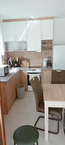 Domki Całoroczne ogrzewane kominkiem