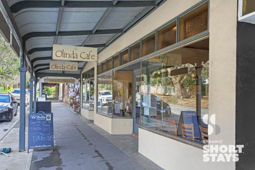 a store front of a street with a store at Birch Suite - Rocky Creek Art Garden in Olinda