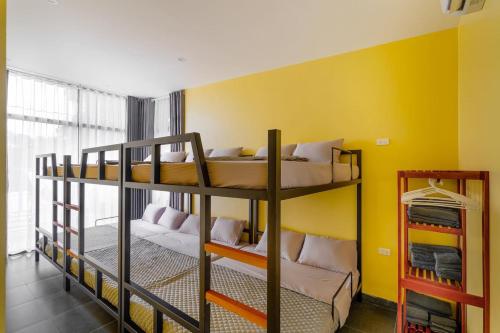 Postel nebo postele na pokoji v ubytování Iris Villas Venuestay