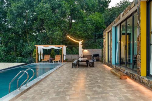Bazén v ubytování Iris Villas Venuestay nebo v jeho okolí