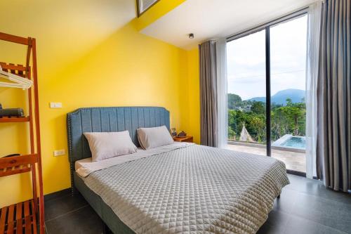 Postel nebo postele na pokoji v ubytování Iris Villas Venuestay