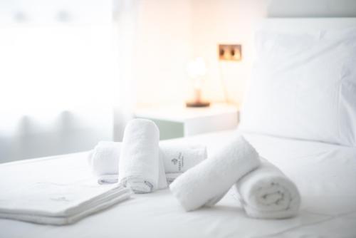 Posteľ alebo postele v izbe v ubytovaní Athenian Dream Suite